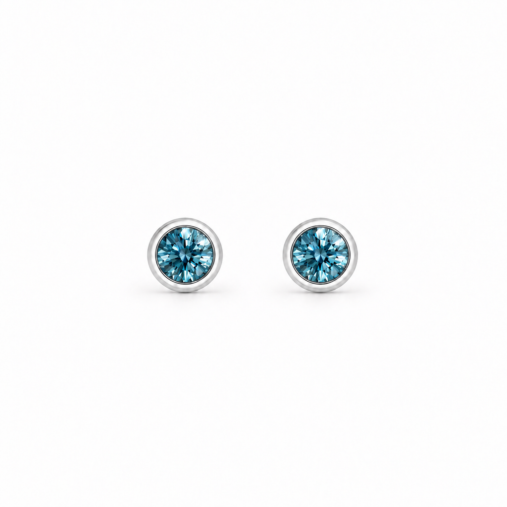 0.5ct Teal Blue Bezel Earrings in platinum setting, by Knightley