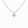 A round brilliant cut moissanite weighing 0.5ct in a classic solitaire necklace, white gold plated sterling silver