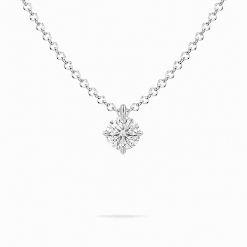 A round brilliant cut moissanite weighing 0.5ct in a classic solitaire necklace, white gold plated sterling silver