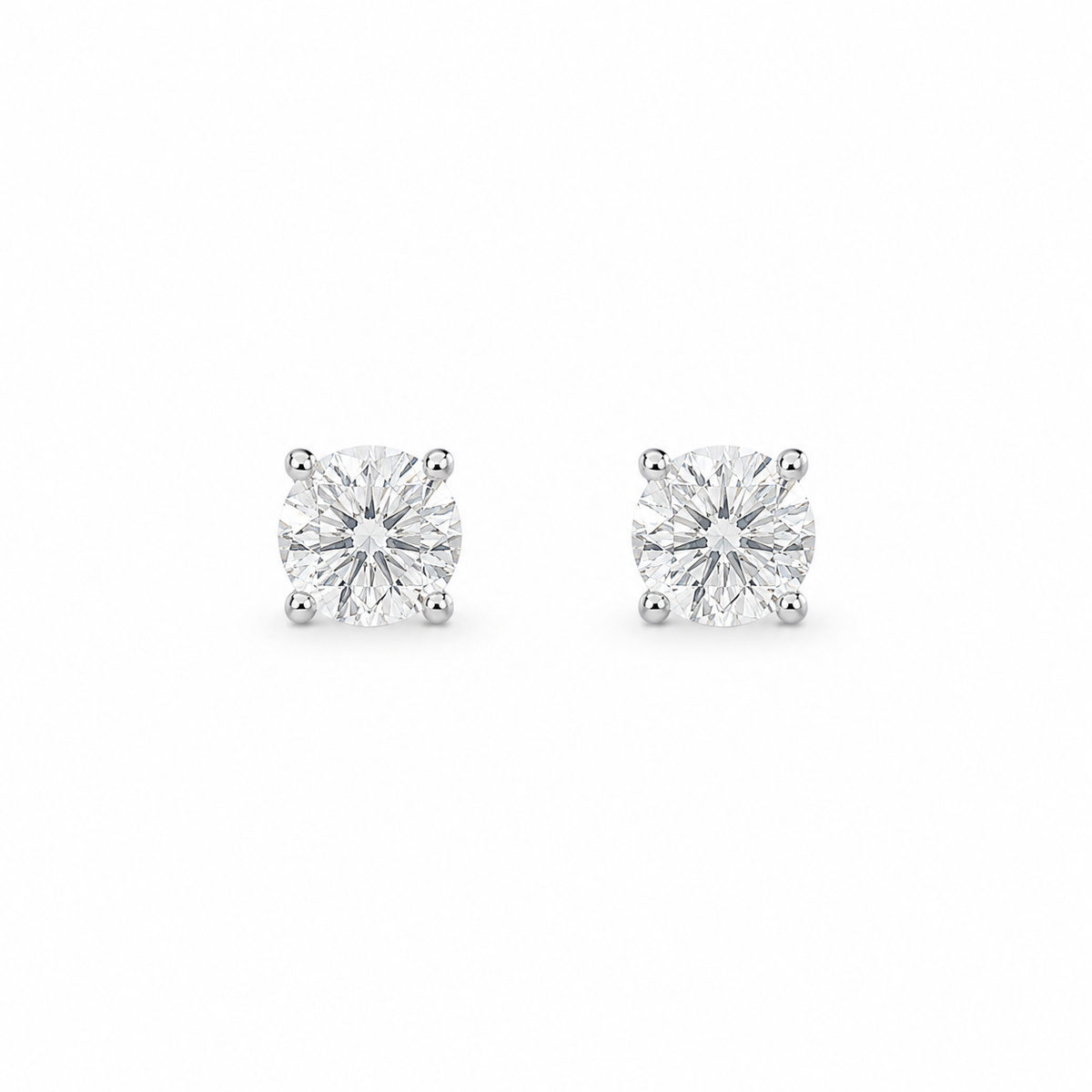 1ct Moissanite Four-Prong Stud Earrings, white gold plated sterling silver