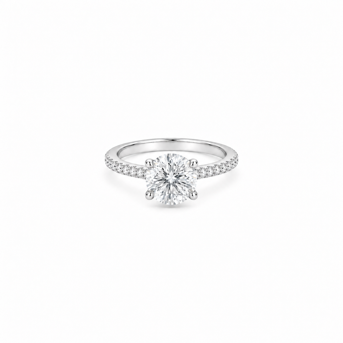 A 2ct round brilliant cut moissanite solitaire ring with a pavé band, white gold plated sterling silver 