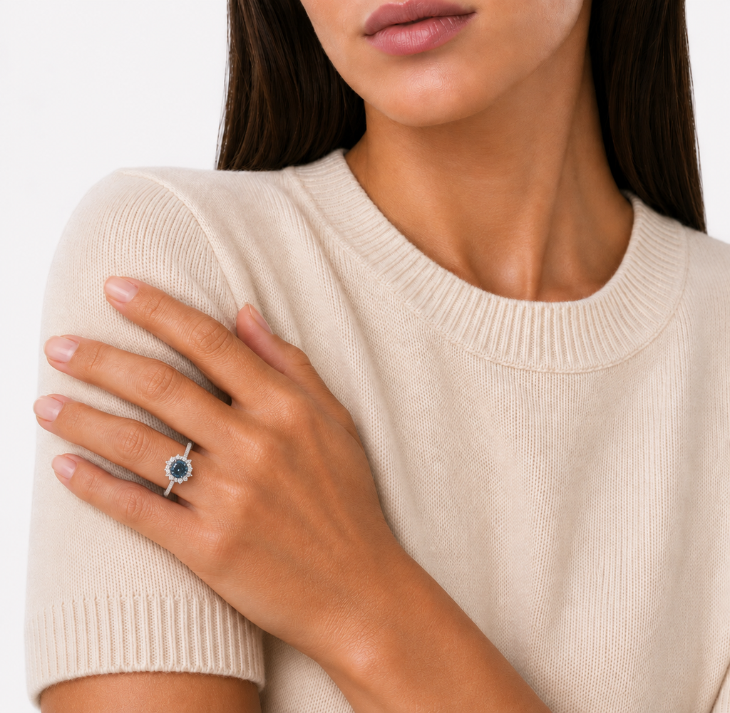 model wears Blue Moissanite Halo Ring, platinum plated sterling silver