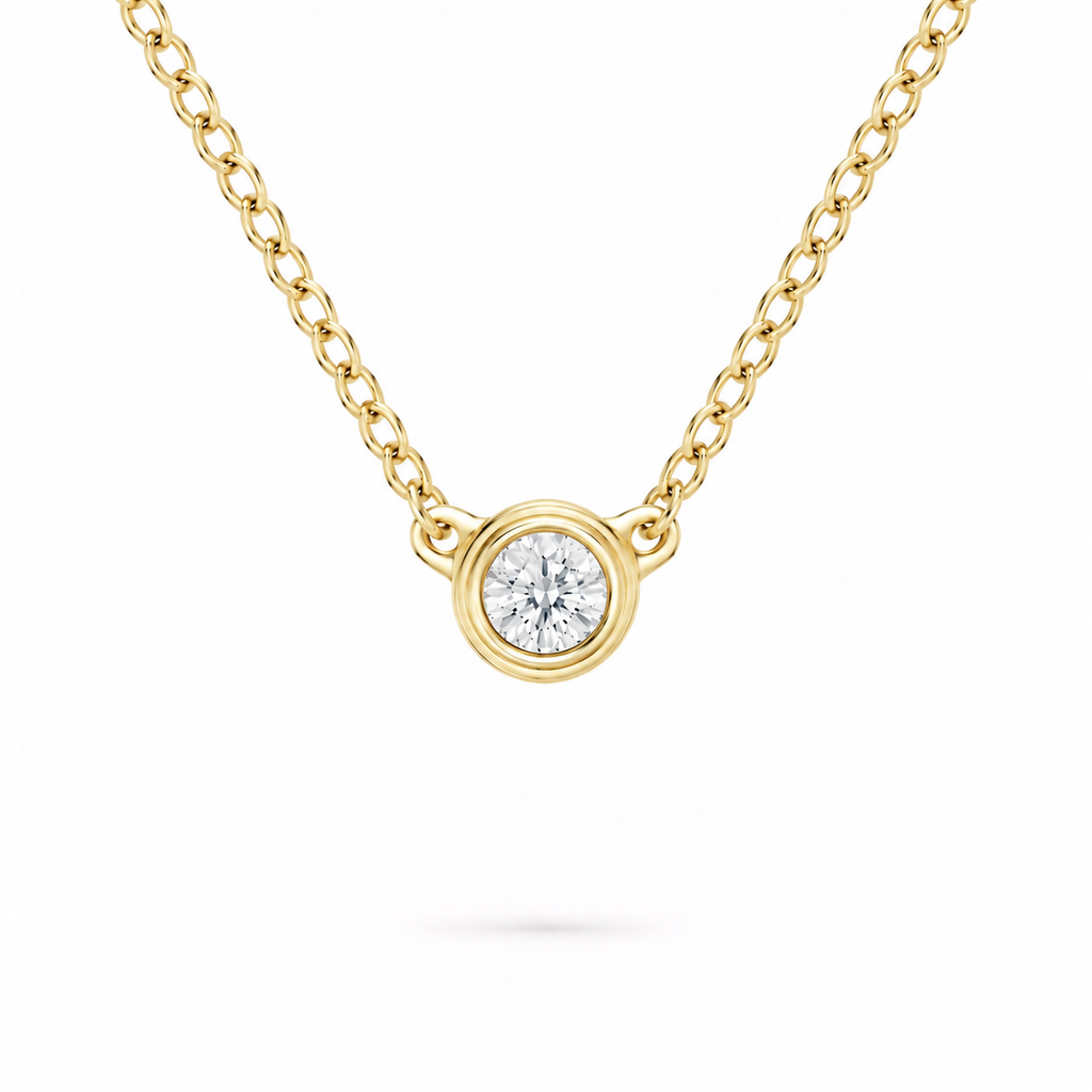 gold bezel necklace in yellow gold plated sterling silver with moissanite