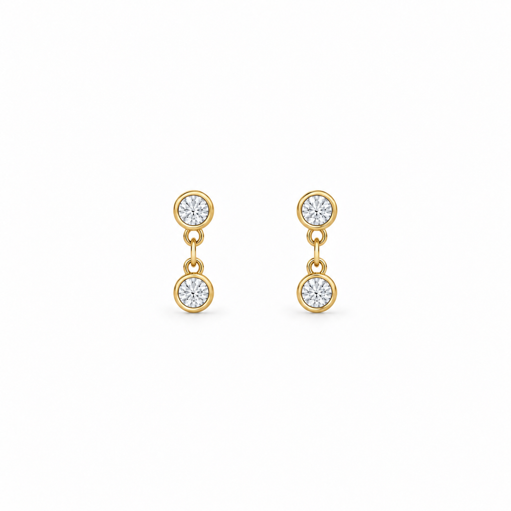 Gold Petite Bezel Drop Earrings with moissanite. 