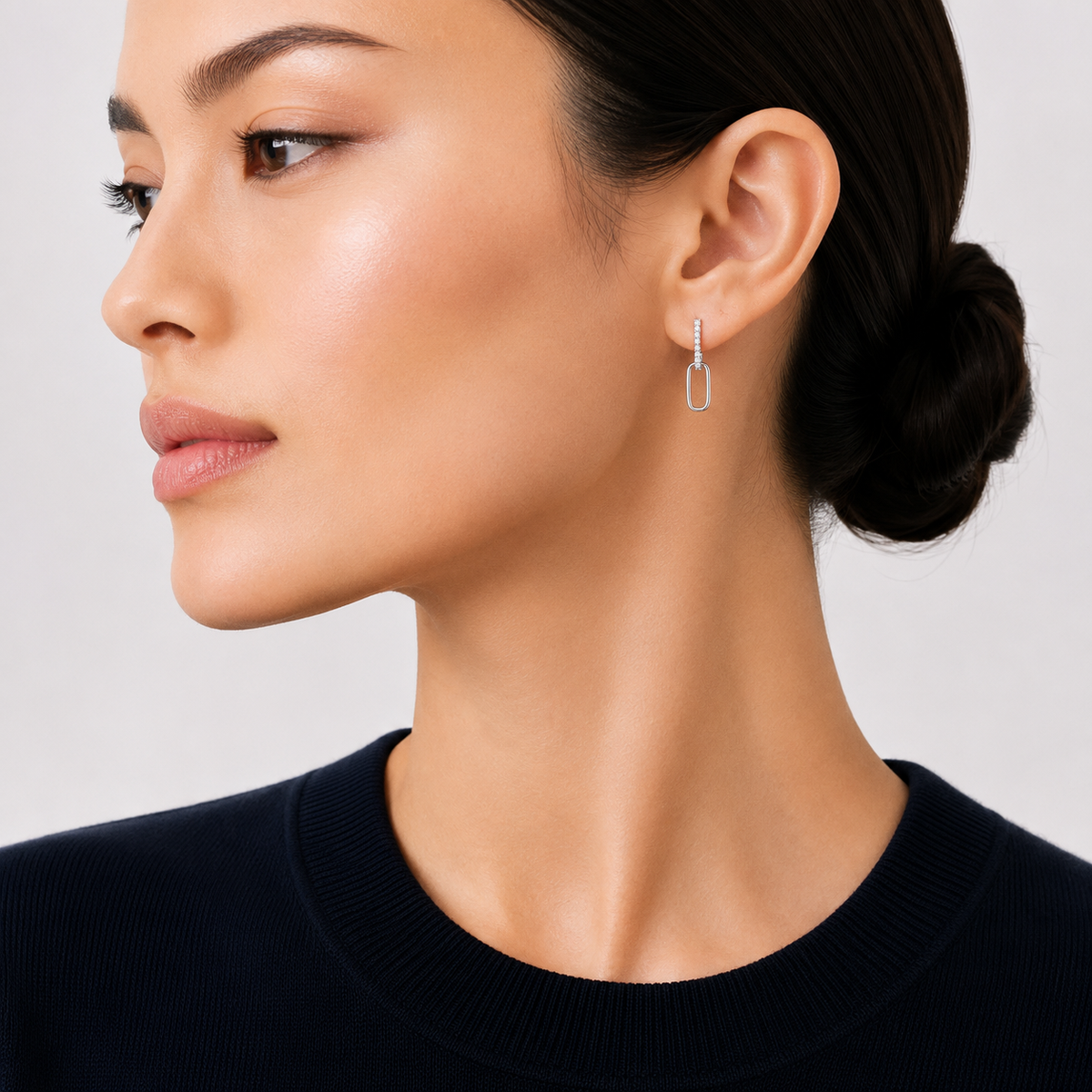 model wears Moissanite Pavé Double Link Hoop Earrings, sterling silver