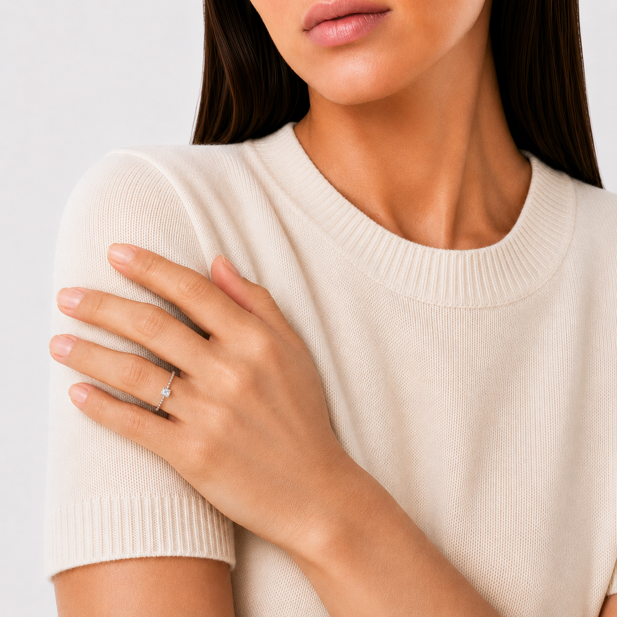 model wears moissanite princess stacking ring, sterling silver